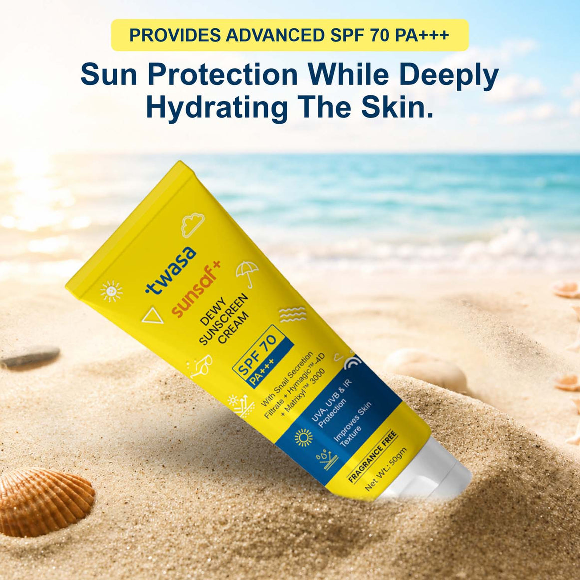 Twasa Sunsaf+ Dewy Sunscreen Cream SPF 70 PA+++ tube on beach sand, highlighting sun protection and hydration.